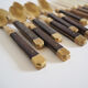 Set of old dessert cutlery in wood and brass