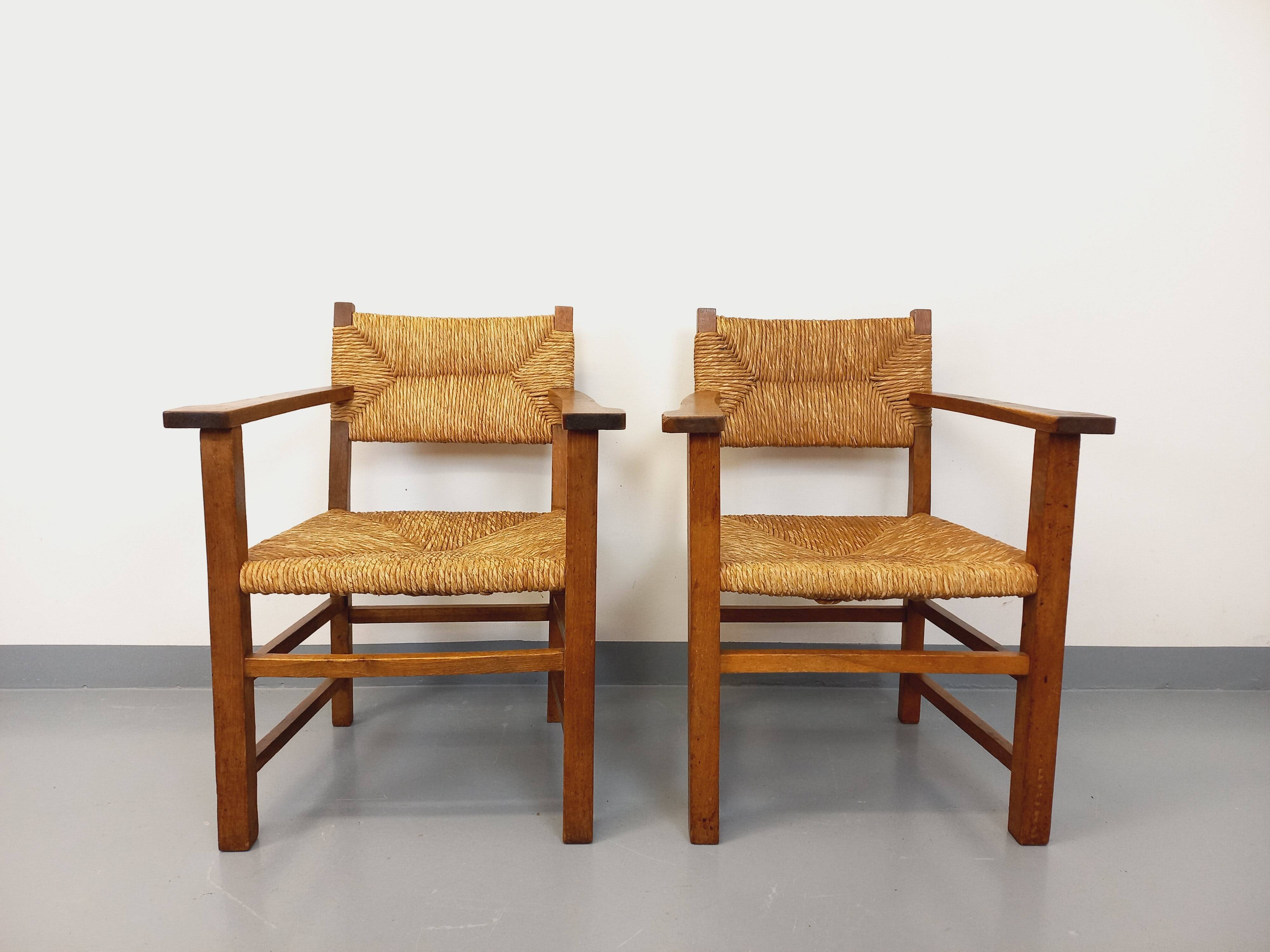 Set of 2 vintage brutalist armchairs in oak wood and straw