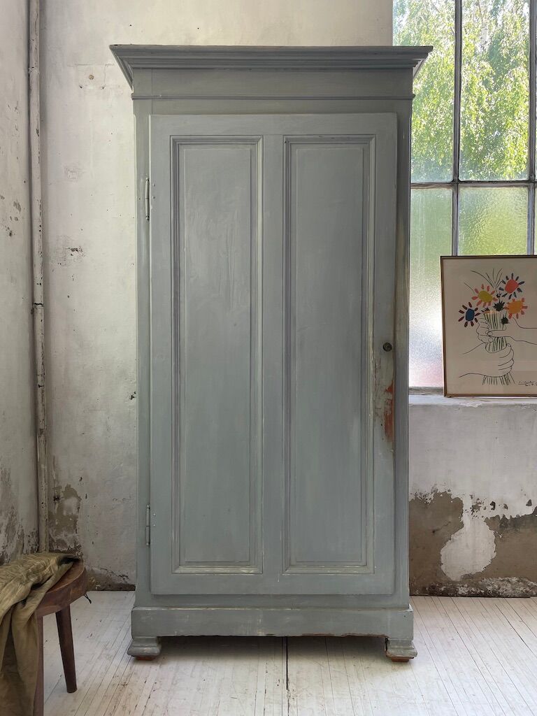 Blue patinated cap cabinet