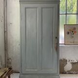 Blue patinated cap cabinet