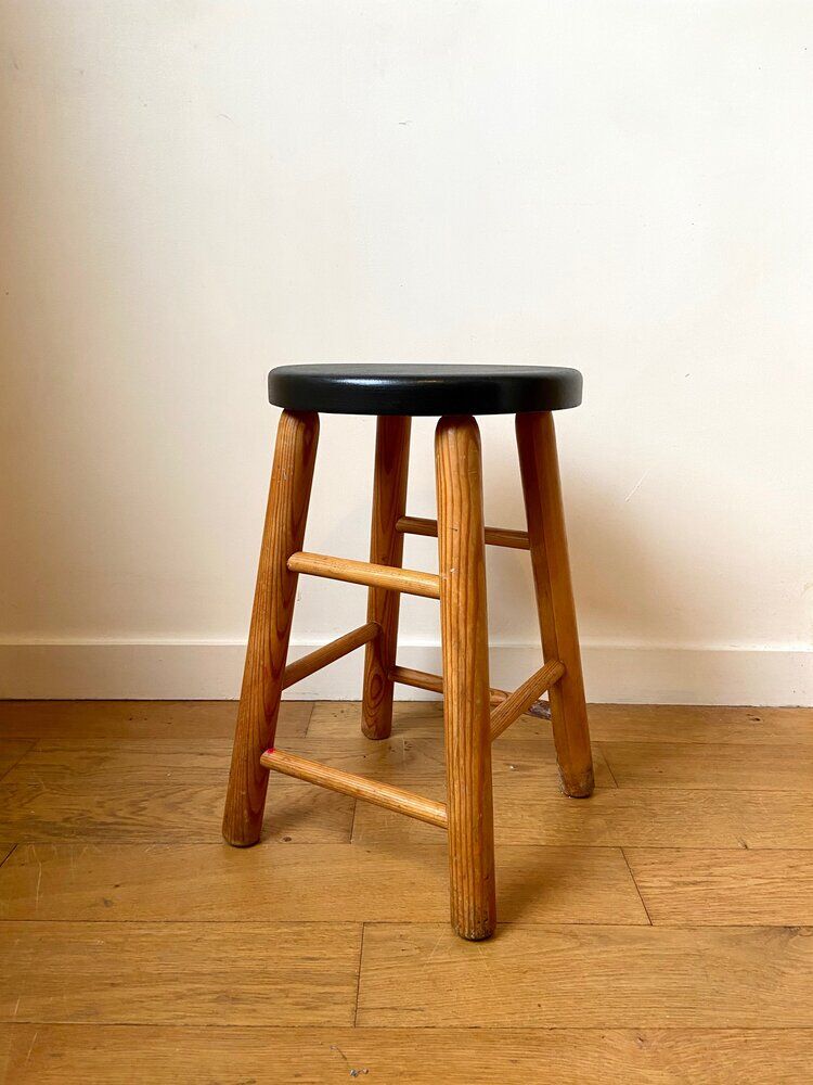 Light and black wooden stool