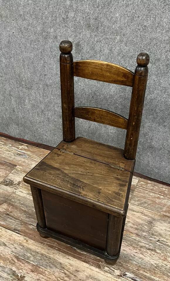 Late 18th century folk art work: child's armchair concealing a chest