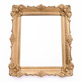 Mirror in a decorative gold frame