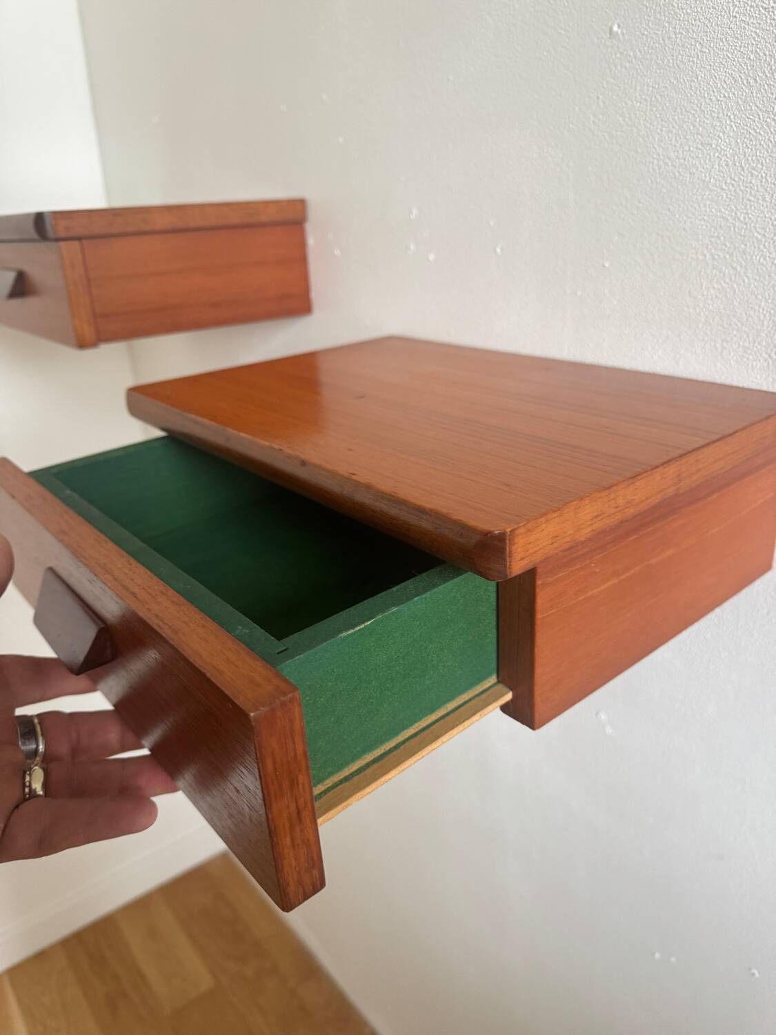 Vintage Scandinavian teak wall-mounted bedside tables.