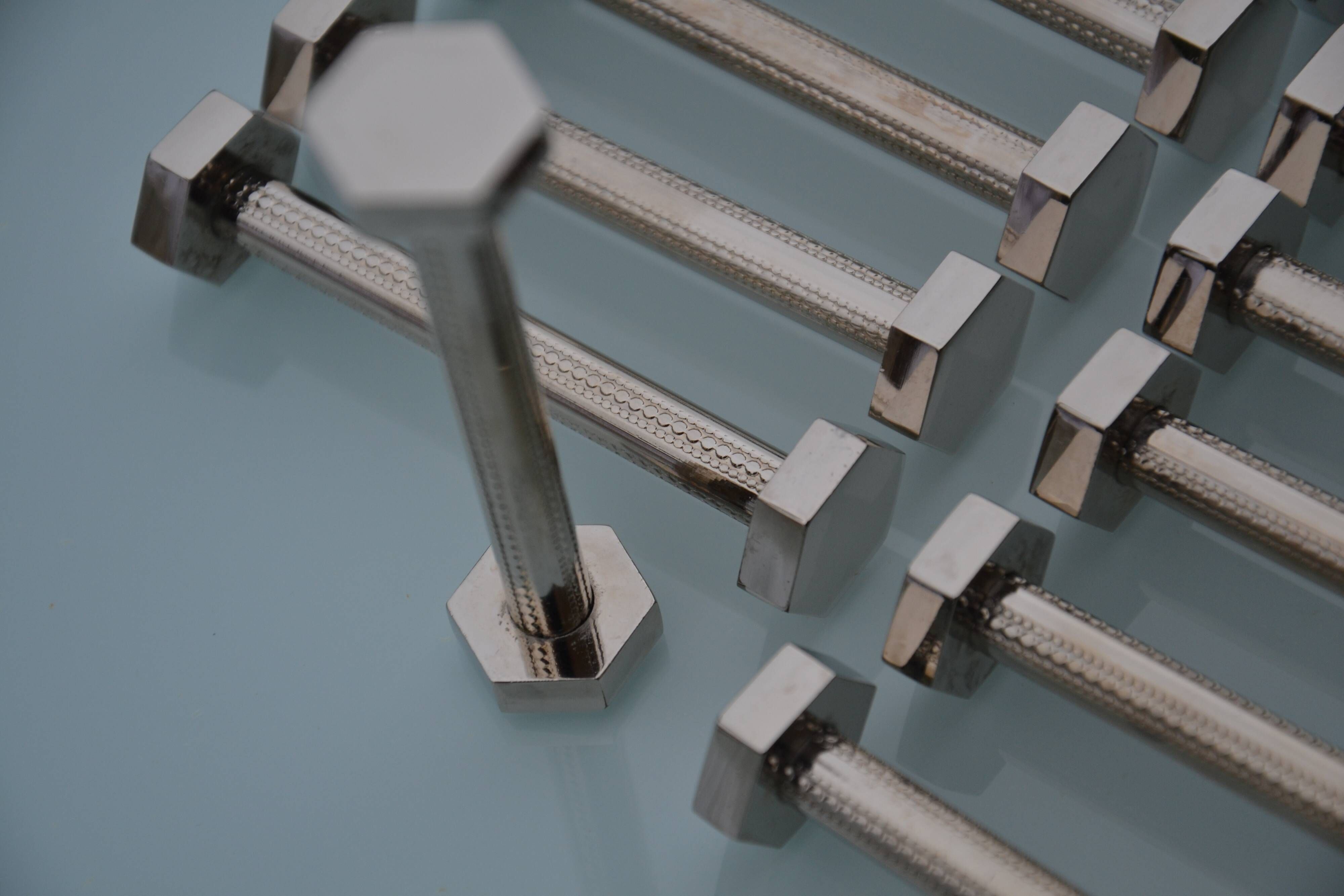 12 bolt-shaped knife rests in their original vintage box