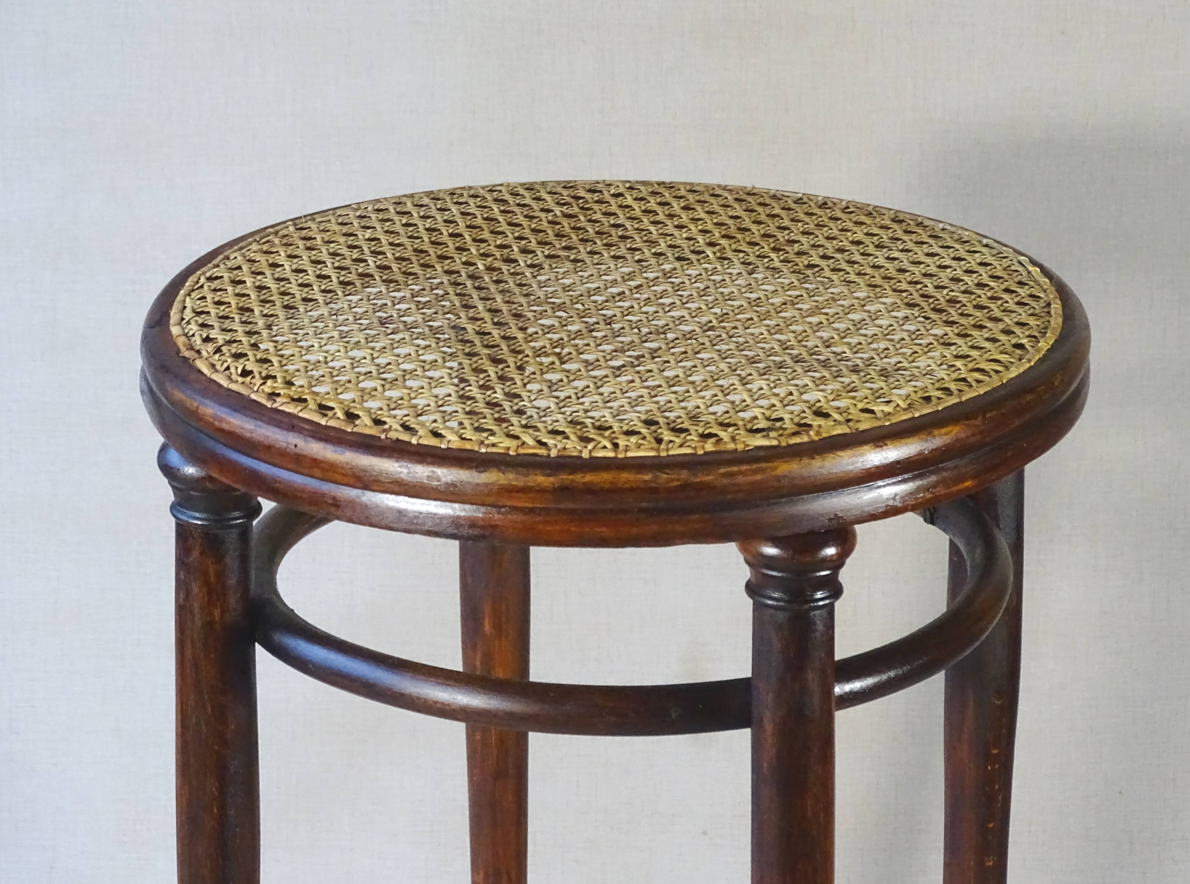 Stool: Bentwood, by Fischel around 1900, caned.