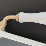 A handle and a Limoges porcelain handle and plate