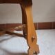 Round beech coffee table with curved legs, 1980s.