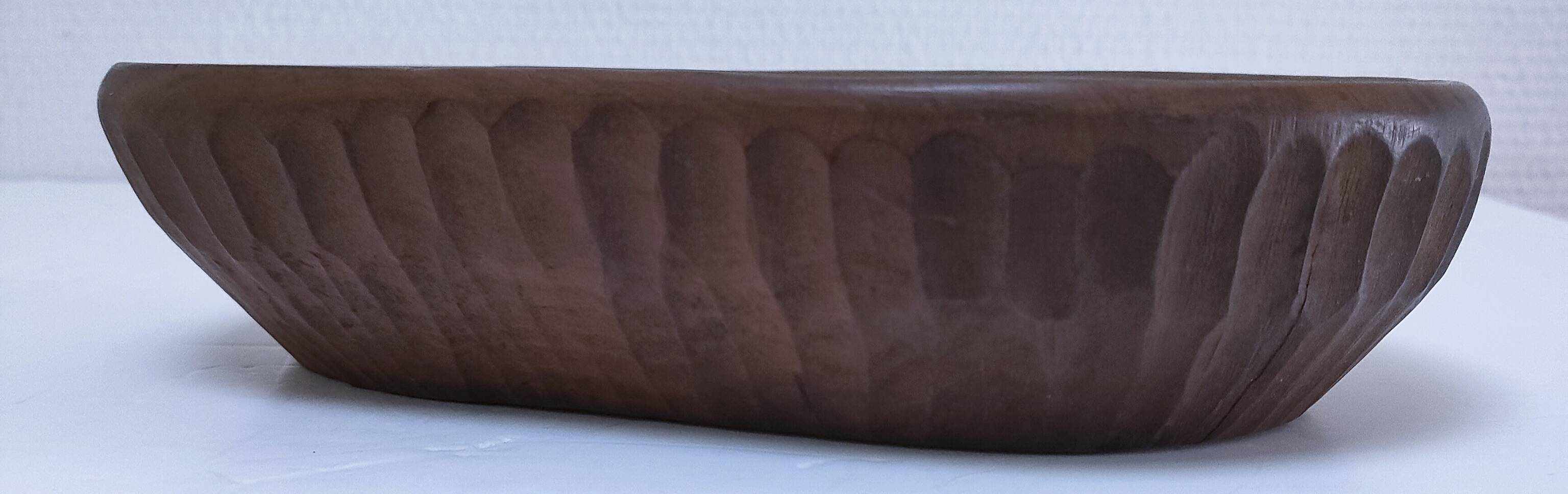 Solid wood pocket emptier, gouged