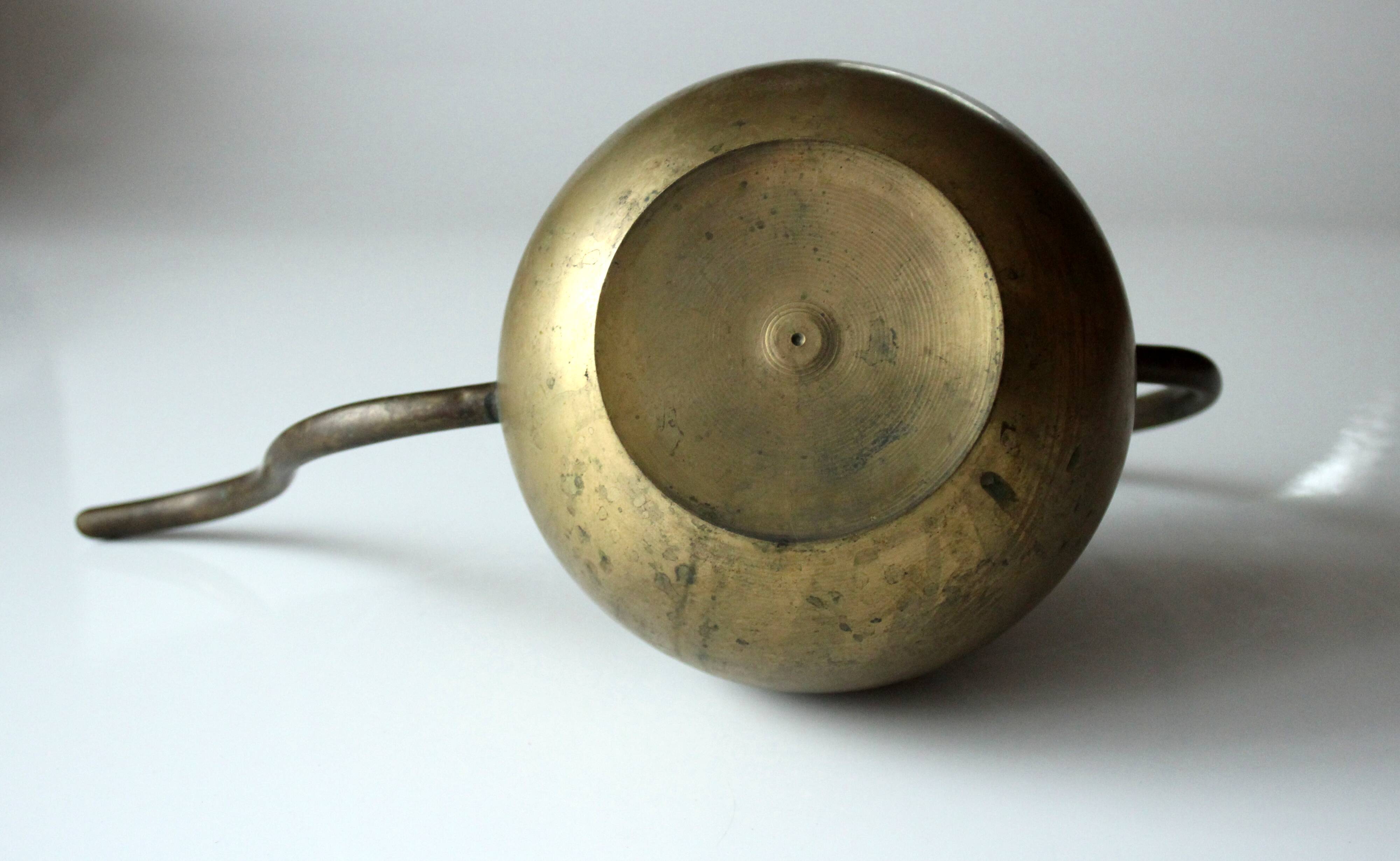 Brass watering can