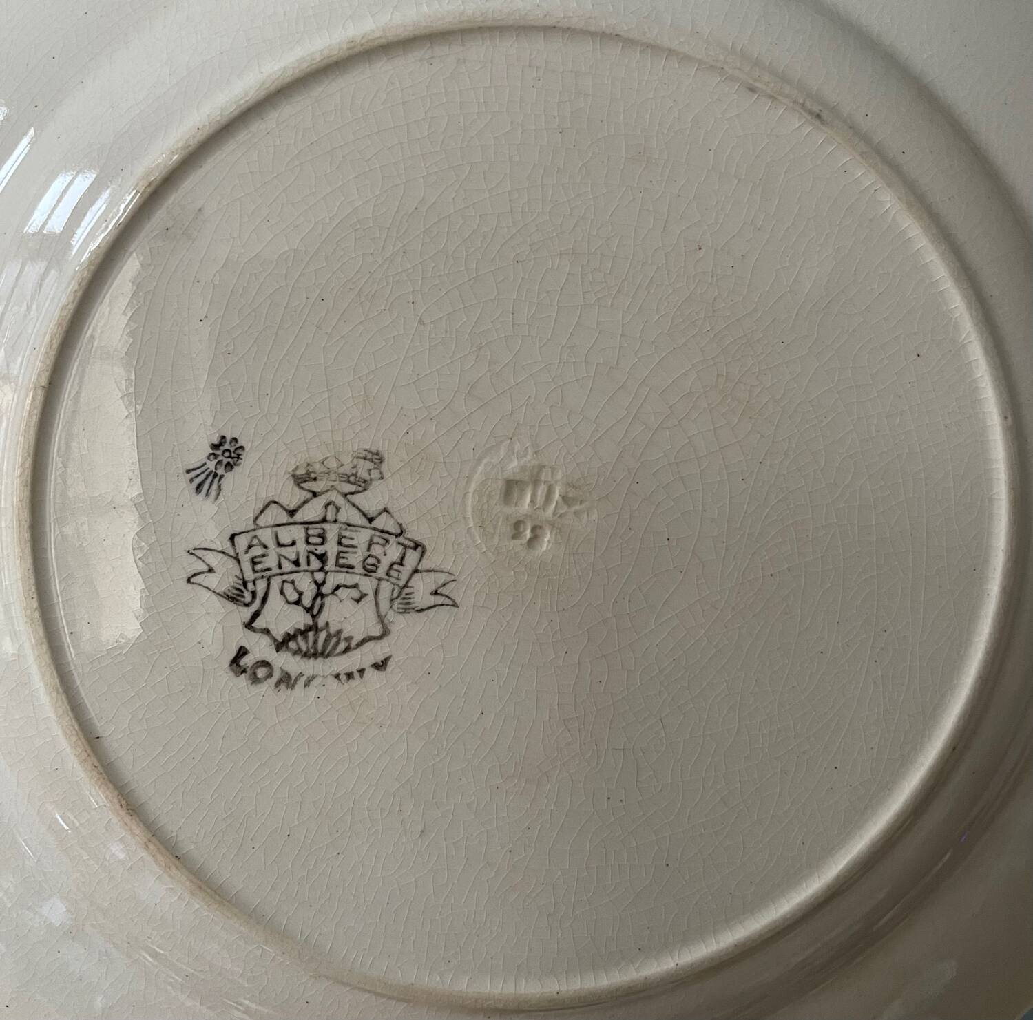 Series of 8 dessert plates 1900 in Longwy earthenware