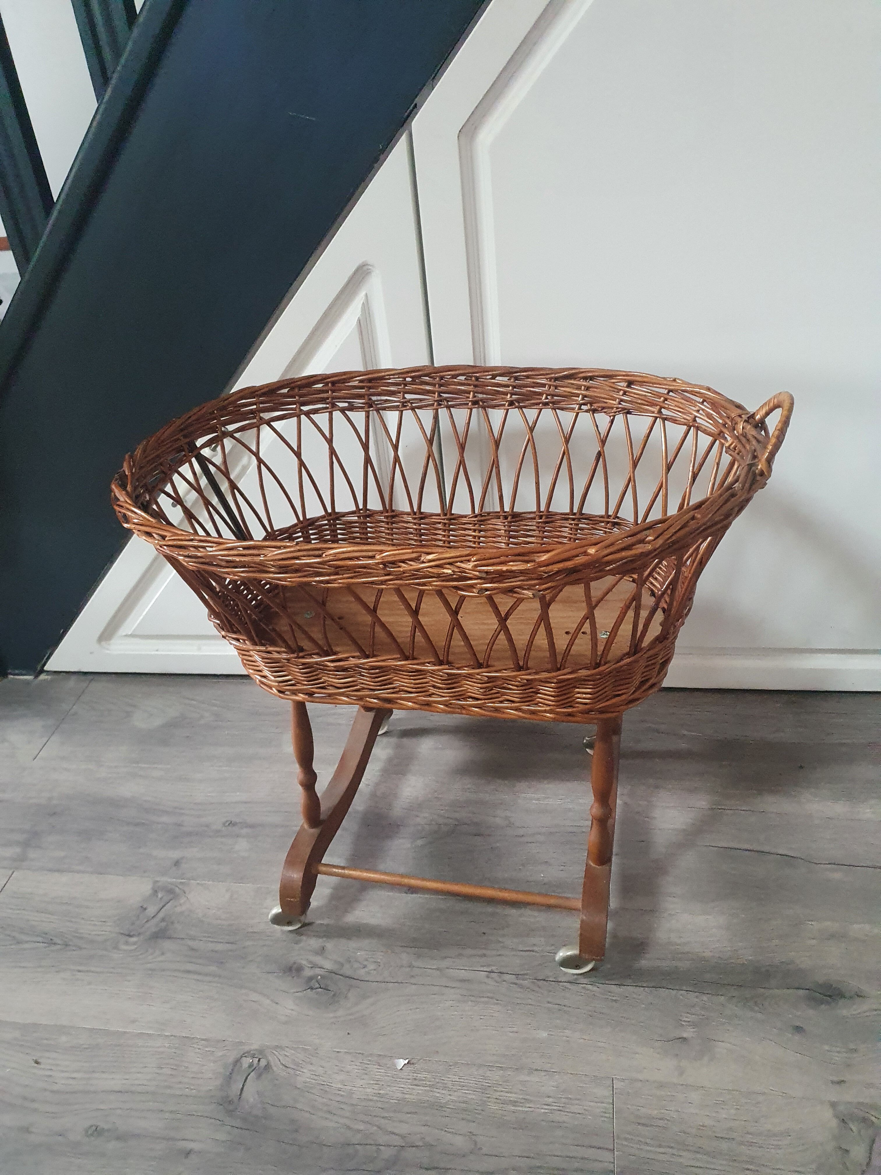 Old vintage rattan crib on wheels, missing a handle 60 by 40cm high 52cm for doll