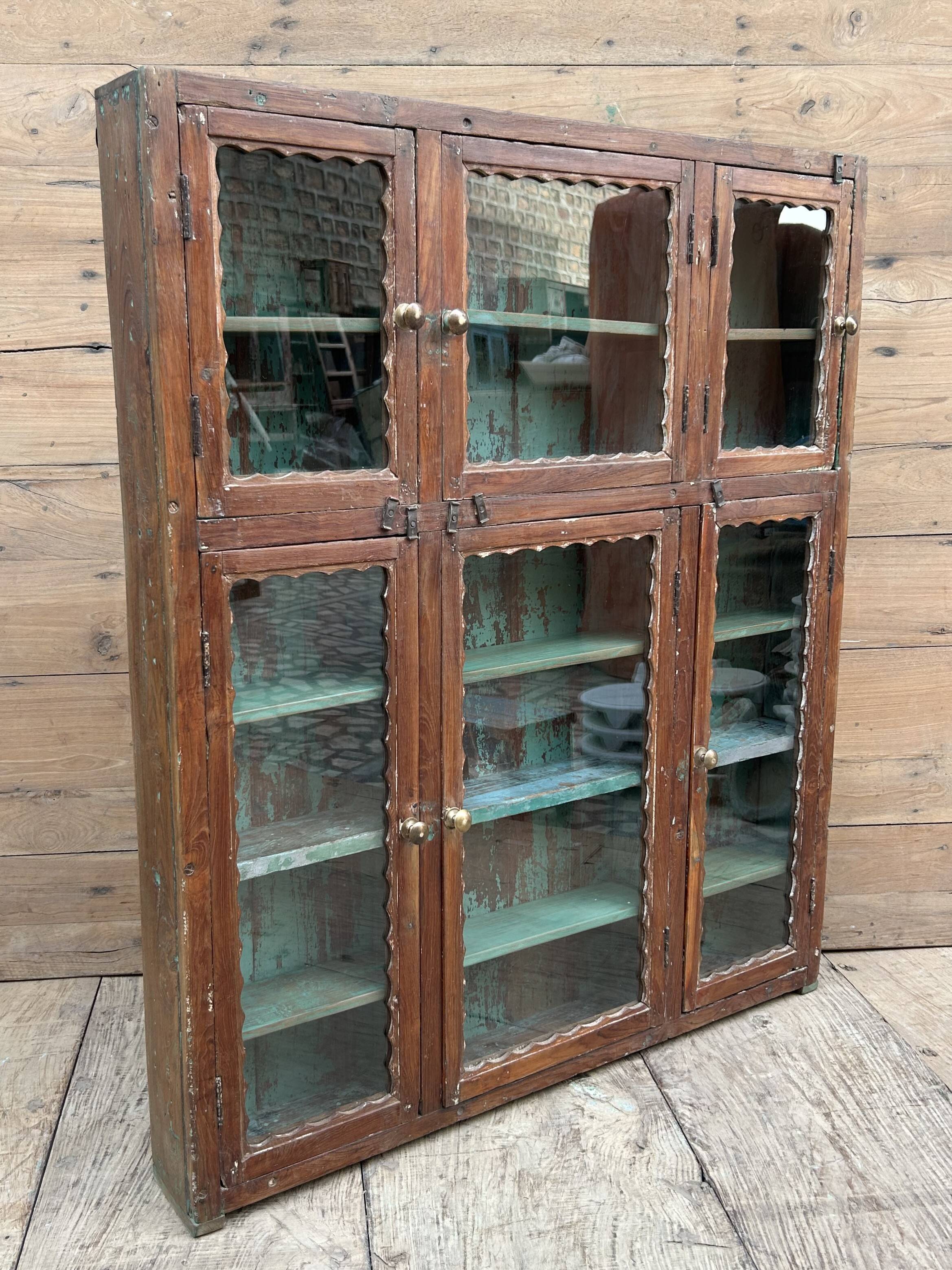 glass library in Burmese teak