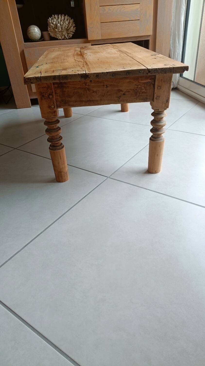 Raw wood coffee table in a country style