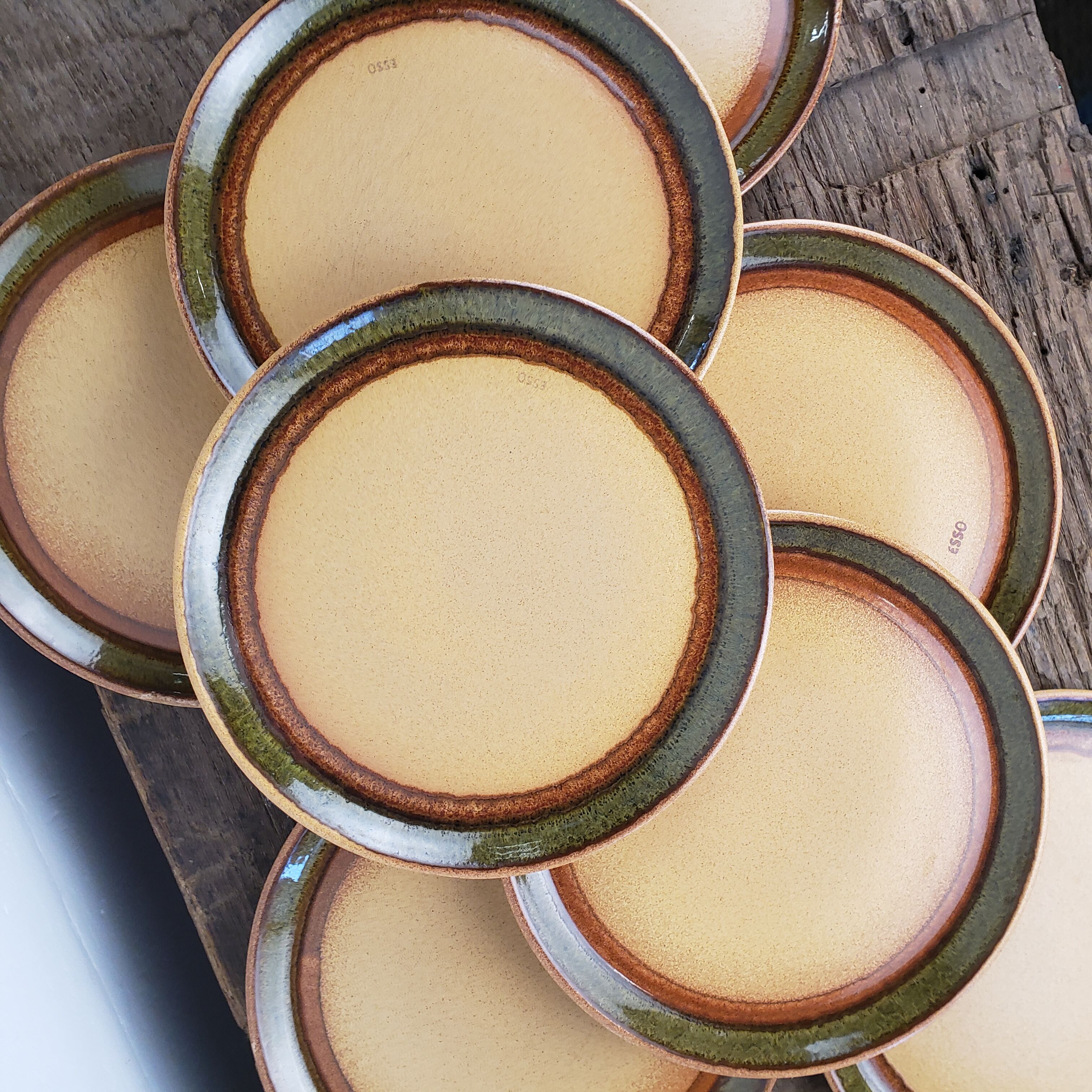 8 flat stoneware plates