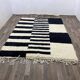 Handmade wool rug size 150 x 250 cm