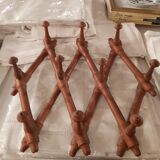 Extendable wall coat rack