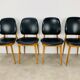 4 chaises Pégases Baumann, noires, années 60