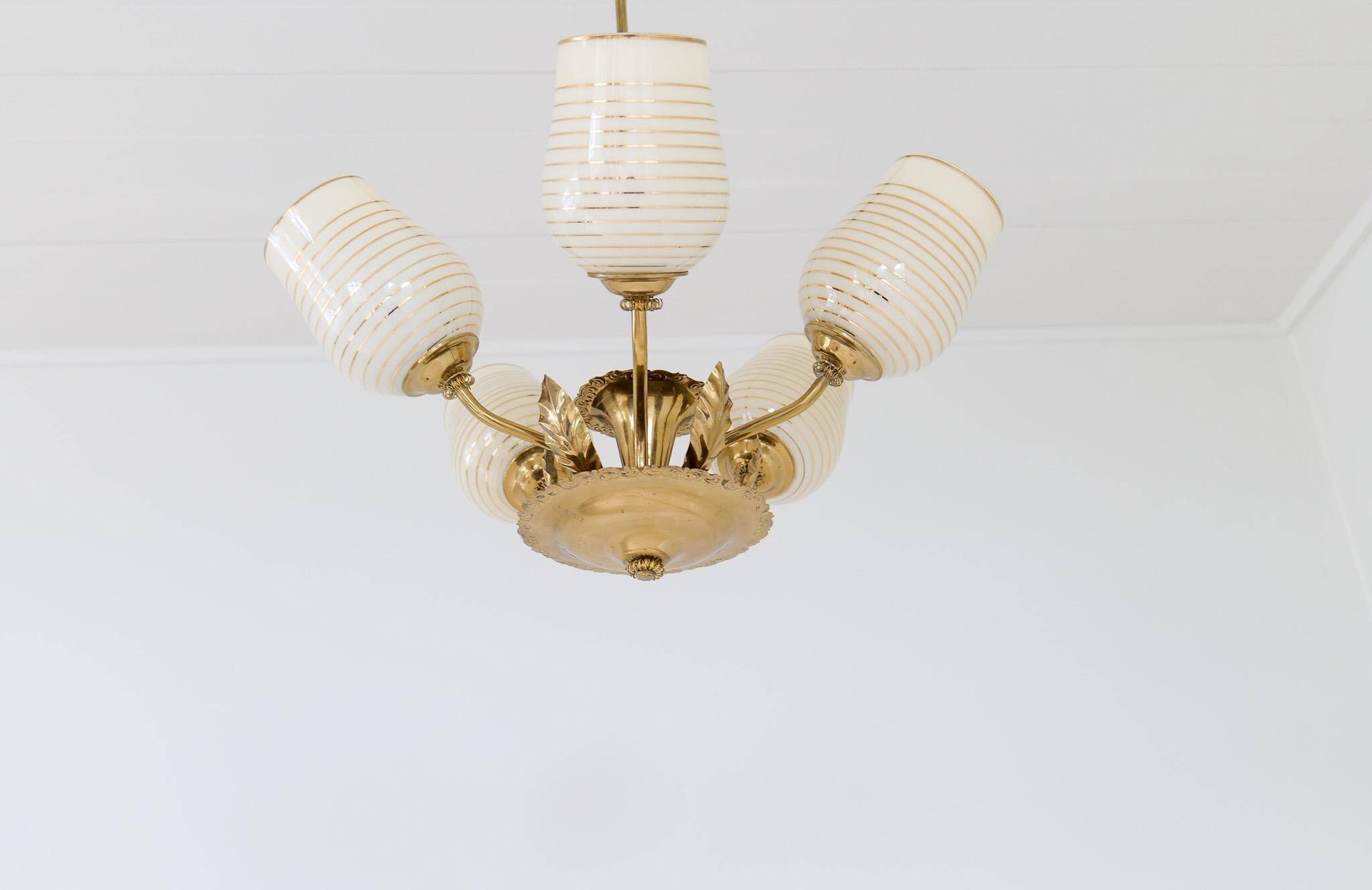 Mid-century brass and glass pendant light by Sario, Finland, 1950s.