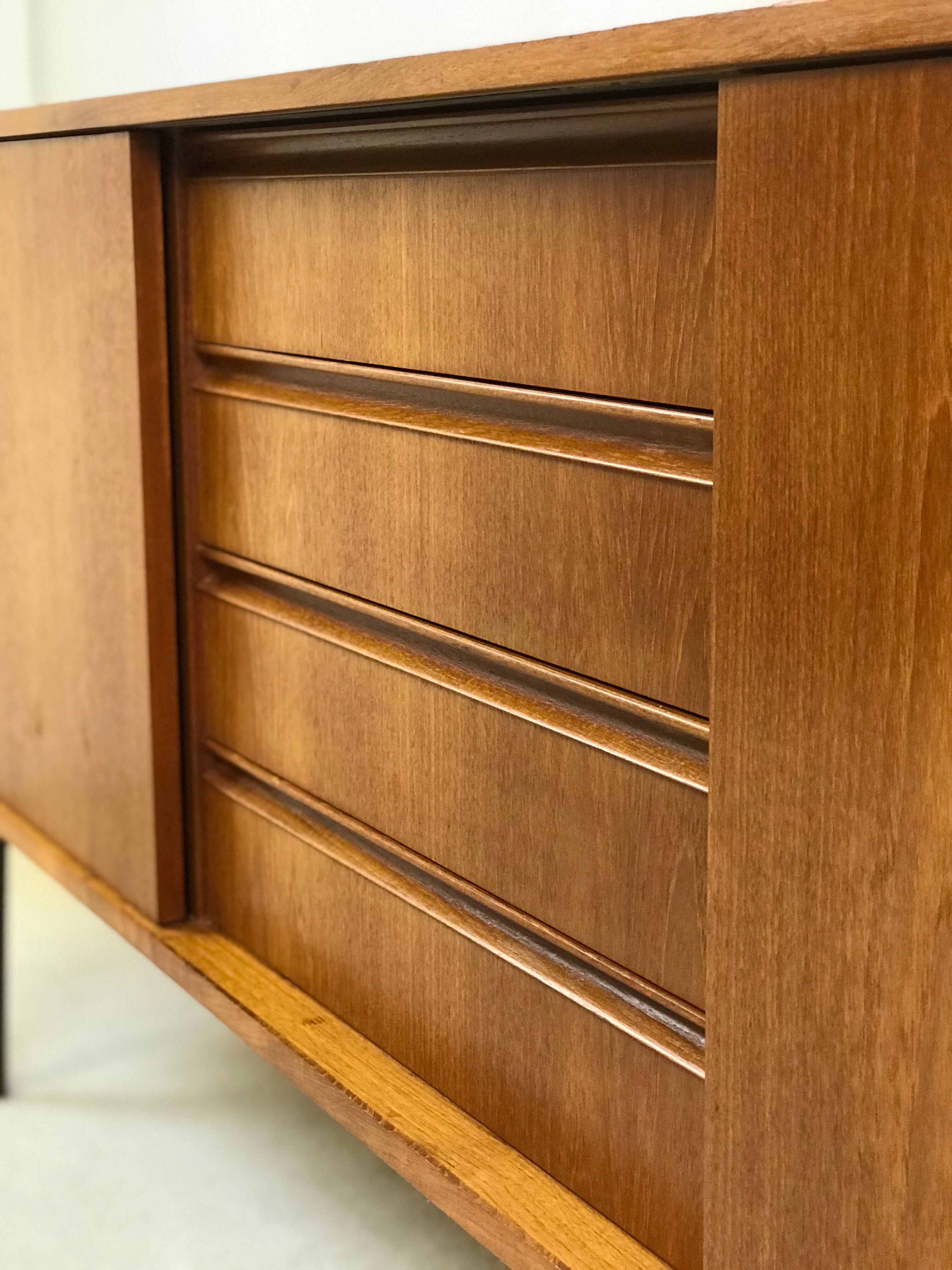 Danish teak sideboard with two sliding doors and 4 central drawers