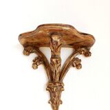 Golden wood wall console in Louis XV style.