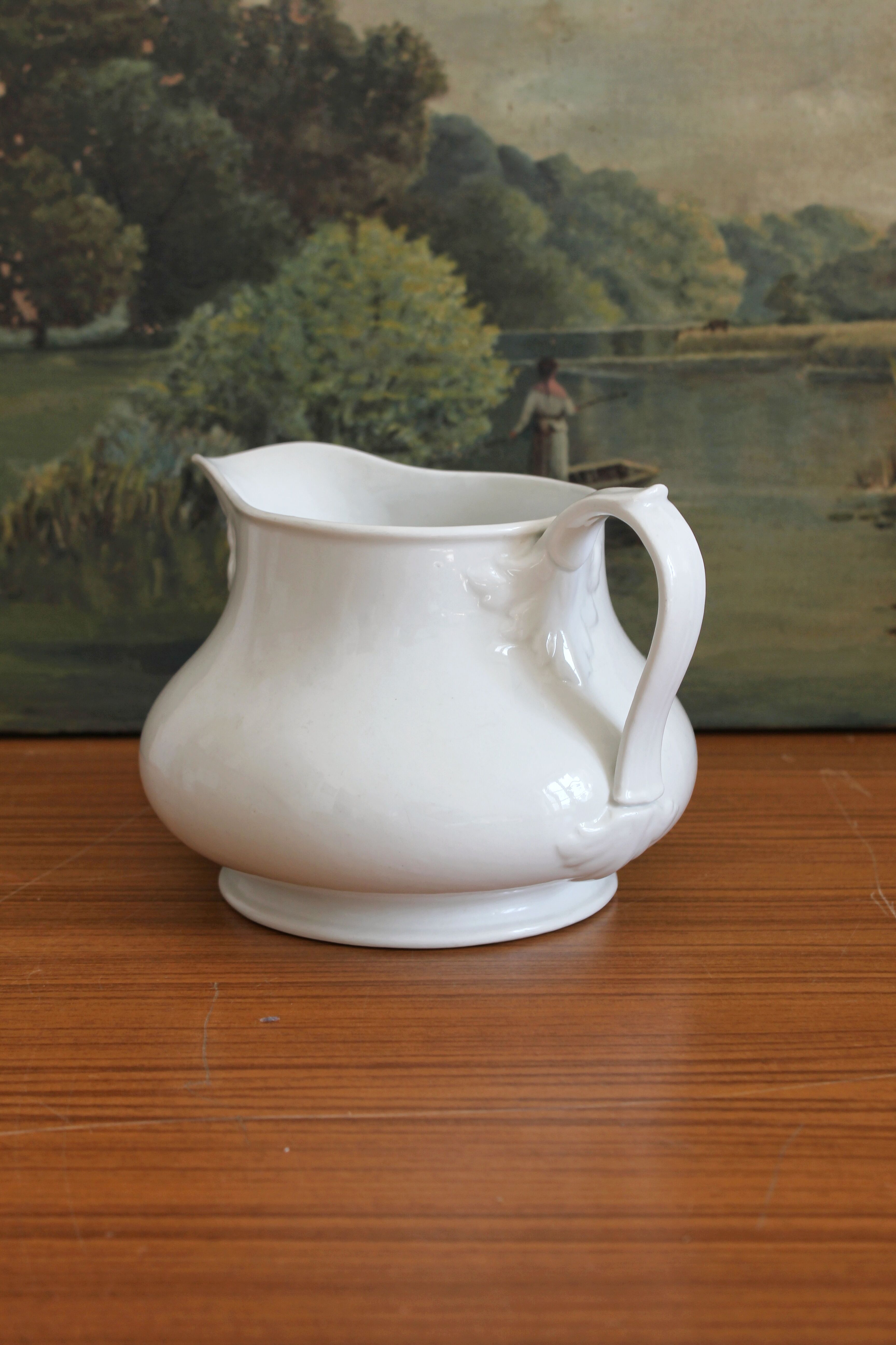 Antique 19th-century white porcelain pitcher