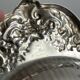 Large silver-plated metal dish, shell shape