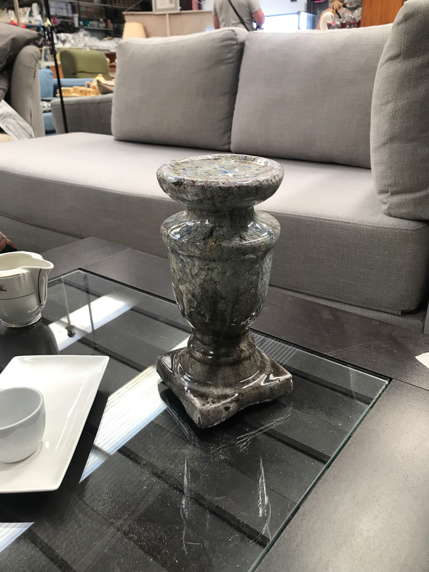 Ceramic candle holder in "Raku" style, blue-grey crackled.