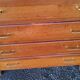 Chest of drawers of the 50s in oak compass feet 4 drawers