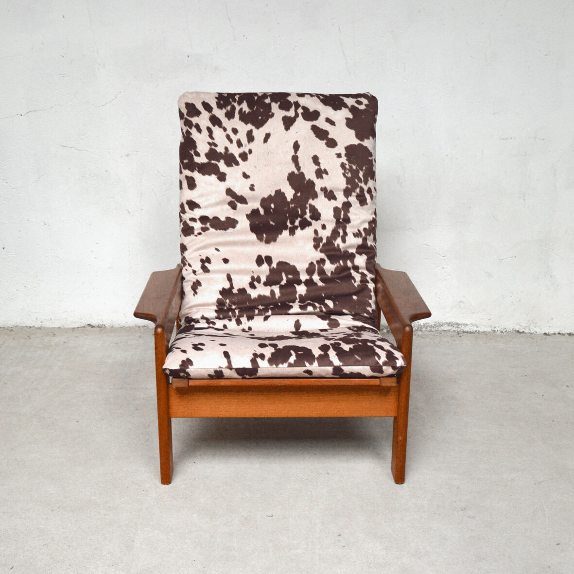 Pair of Danish teak armchairs and footrests, 1960