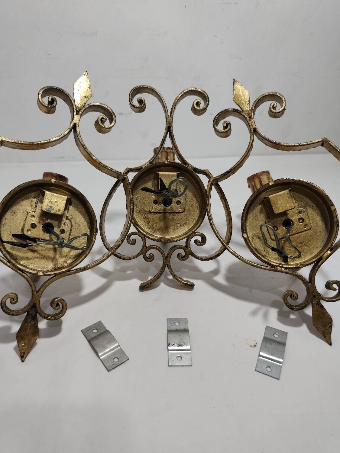 Apliques de hierro forjado y pan de oro. España, 1960s.