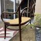 Antique Thonet bench in bent wood and caning, signed.