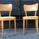 Paire de chaises Baumann en bois et skaÏ jaune vintage