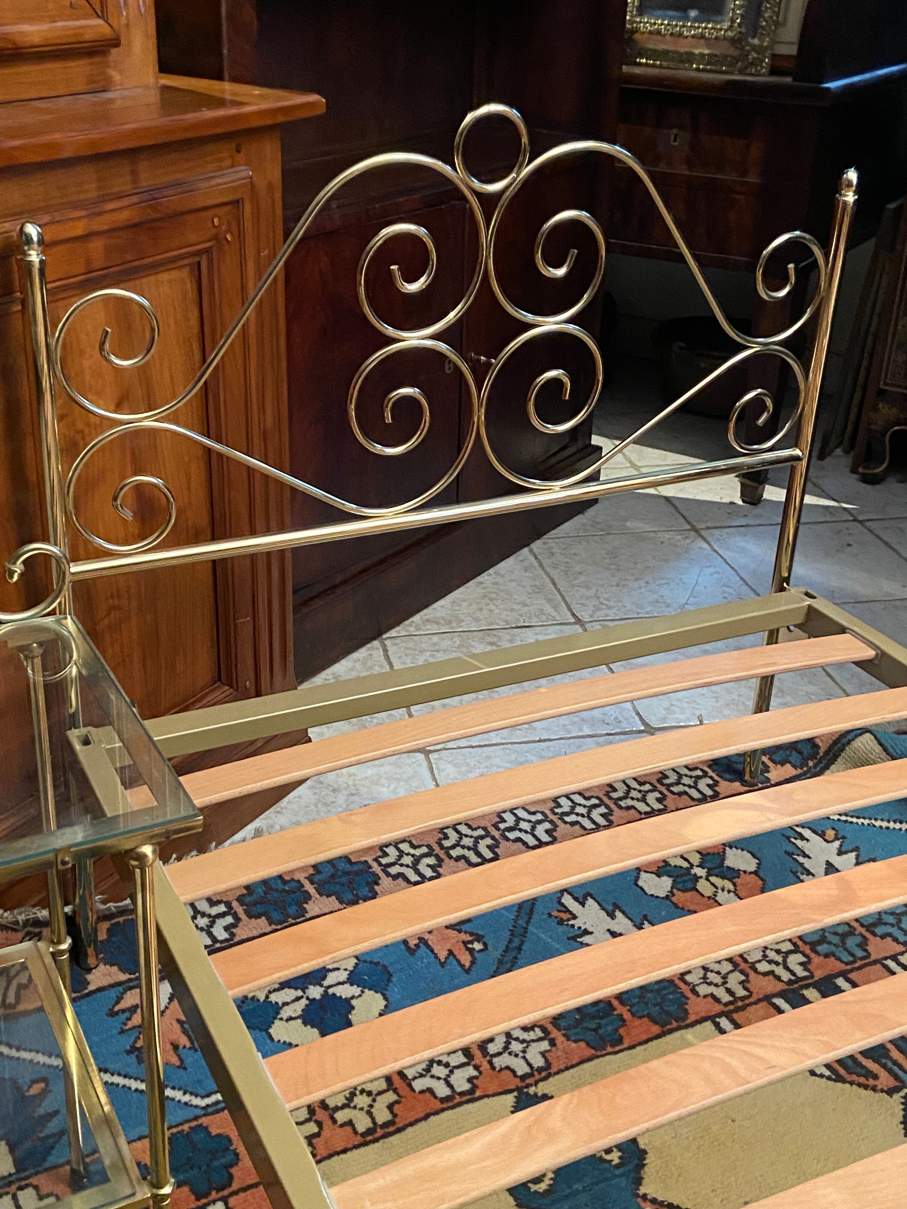 Romantic style single bed in brass with bedside table