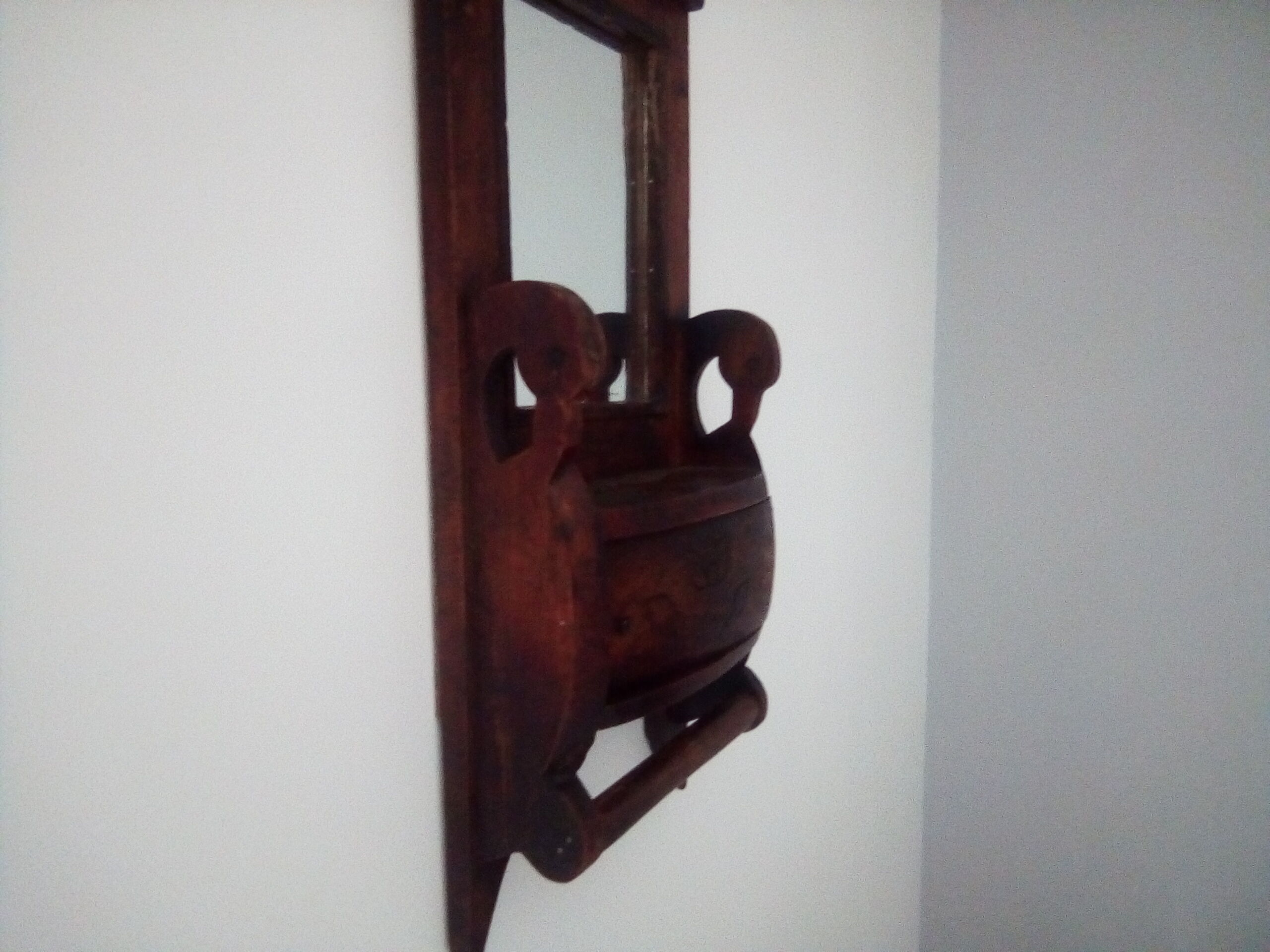Old art deco barber mirror in teak