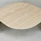 Table basse de forme courbe, travertin, France, circa 1970.