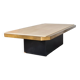 Coffee table in brass and travertine.