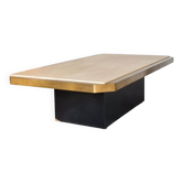 Coffee table in brass and travertine.