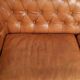 Sheepskin 2.5-seater Chesterfield sofa in a light cognac colour