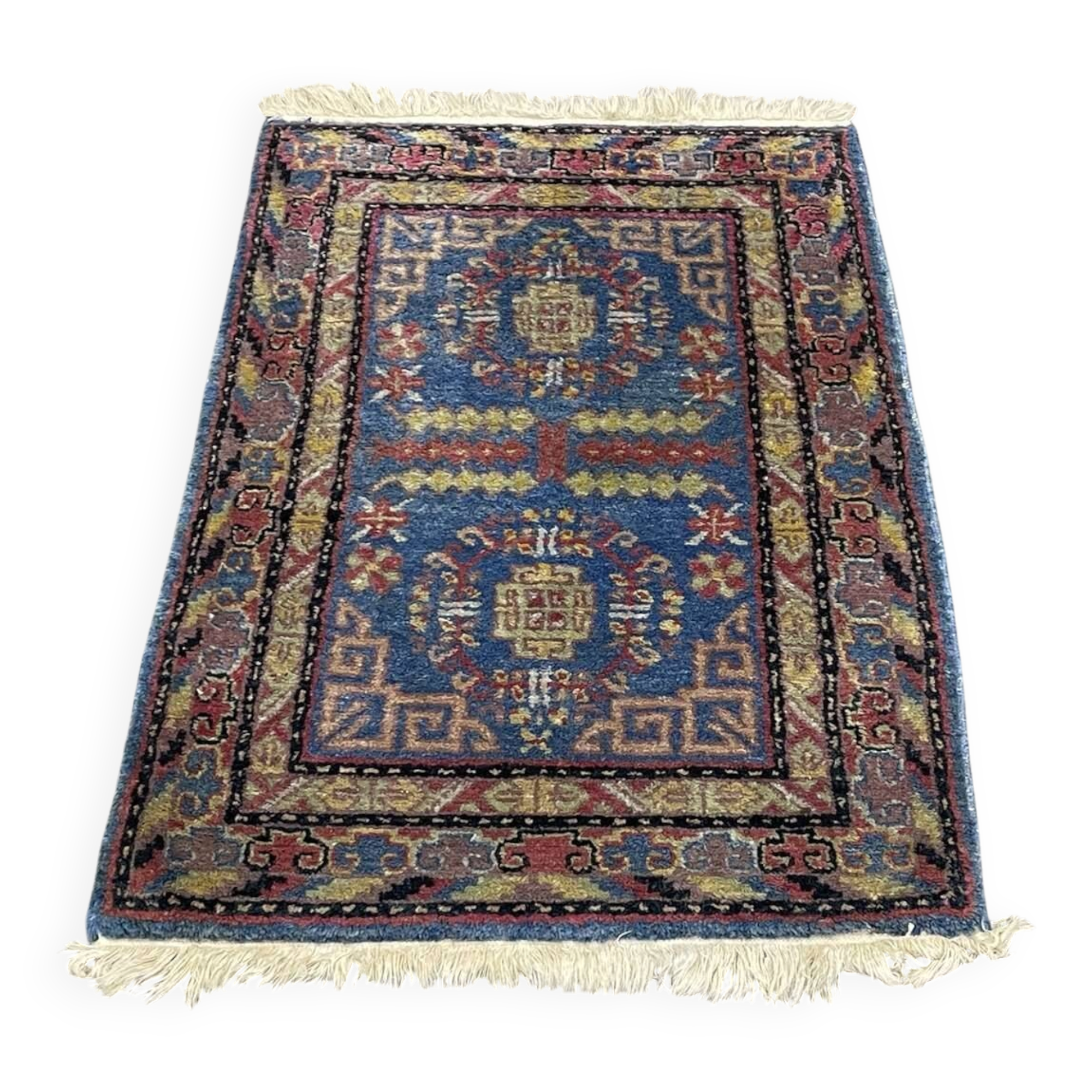 Small handmade wool Iranian rug.