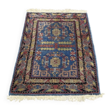 Small handmade wool Iranian rug.