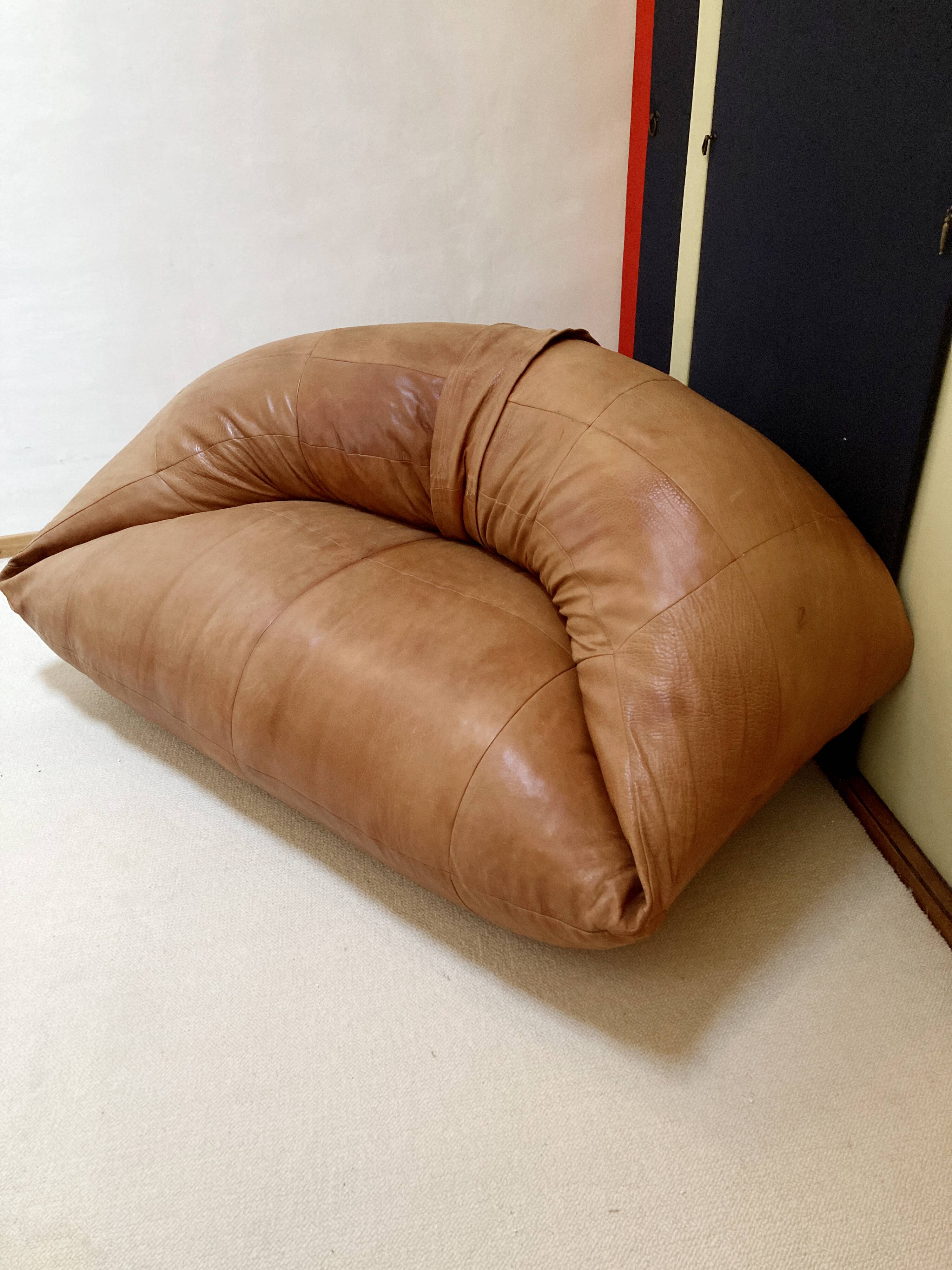Two-seater leather pouf sofa by Raphaël Raffel for Honoré Paris