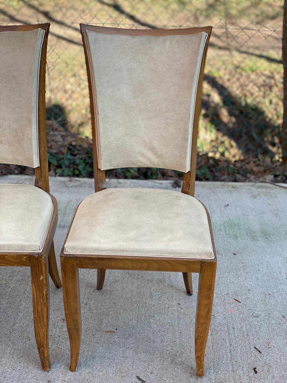 6 Italian Scandinavian style dining chairs from the 1950s in wood and leather.