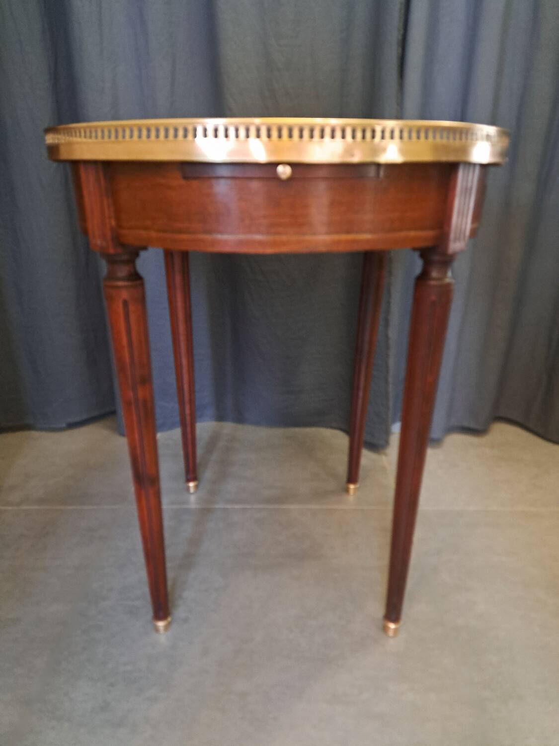 Mahogany and marble bouillotte table