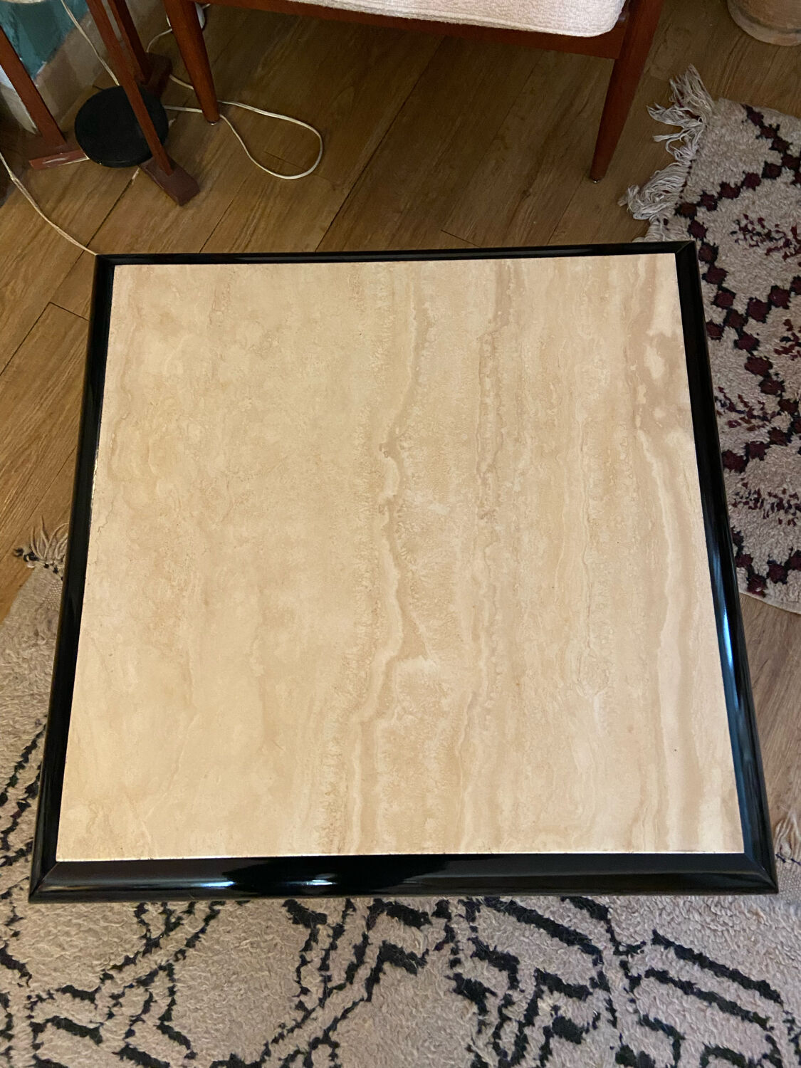 Coffee table in lacquered wood and vintage travertine