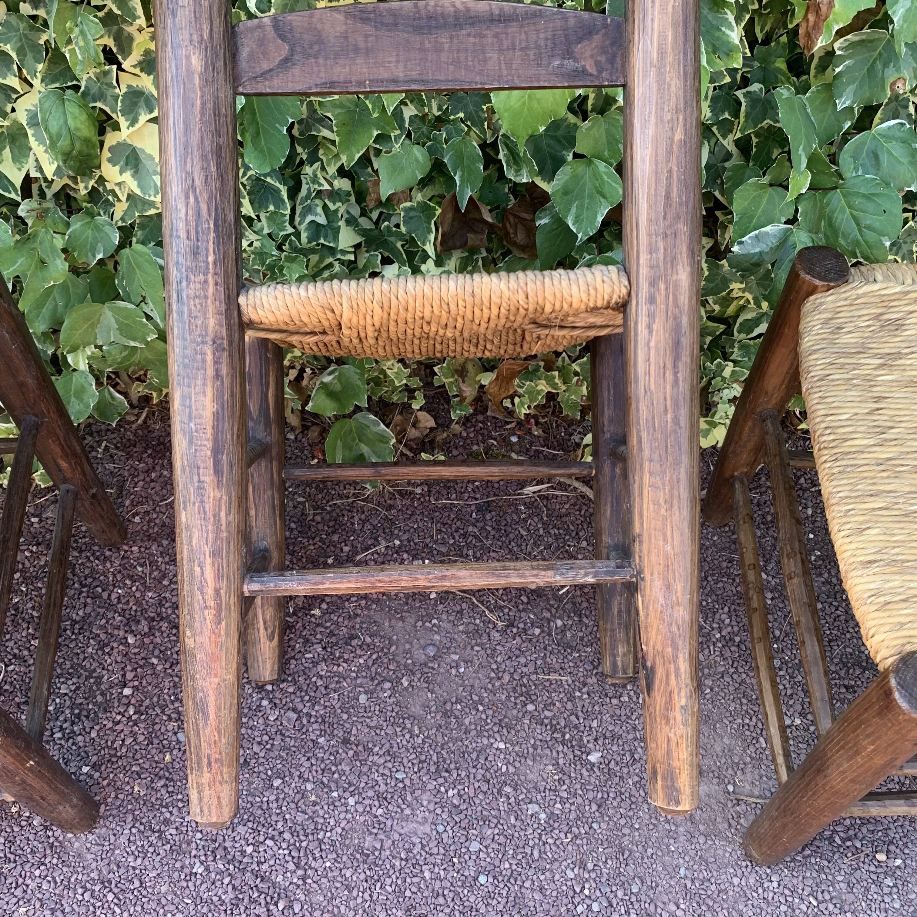 Set of 4 handcrafted rush chairs in solid oak.