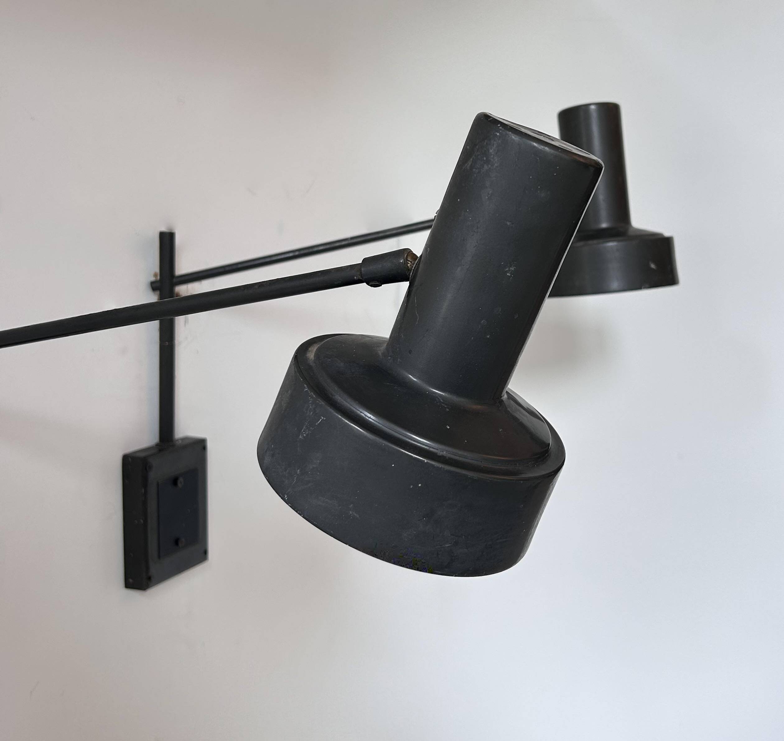 Pair of vintage adjustable wall lights, matte black metal, France 1960s