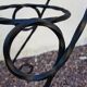 Black wrought iron plant holder