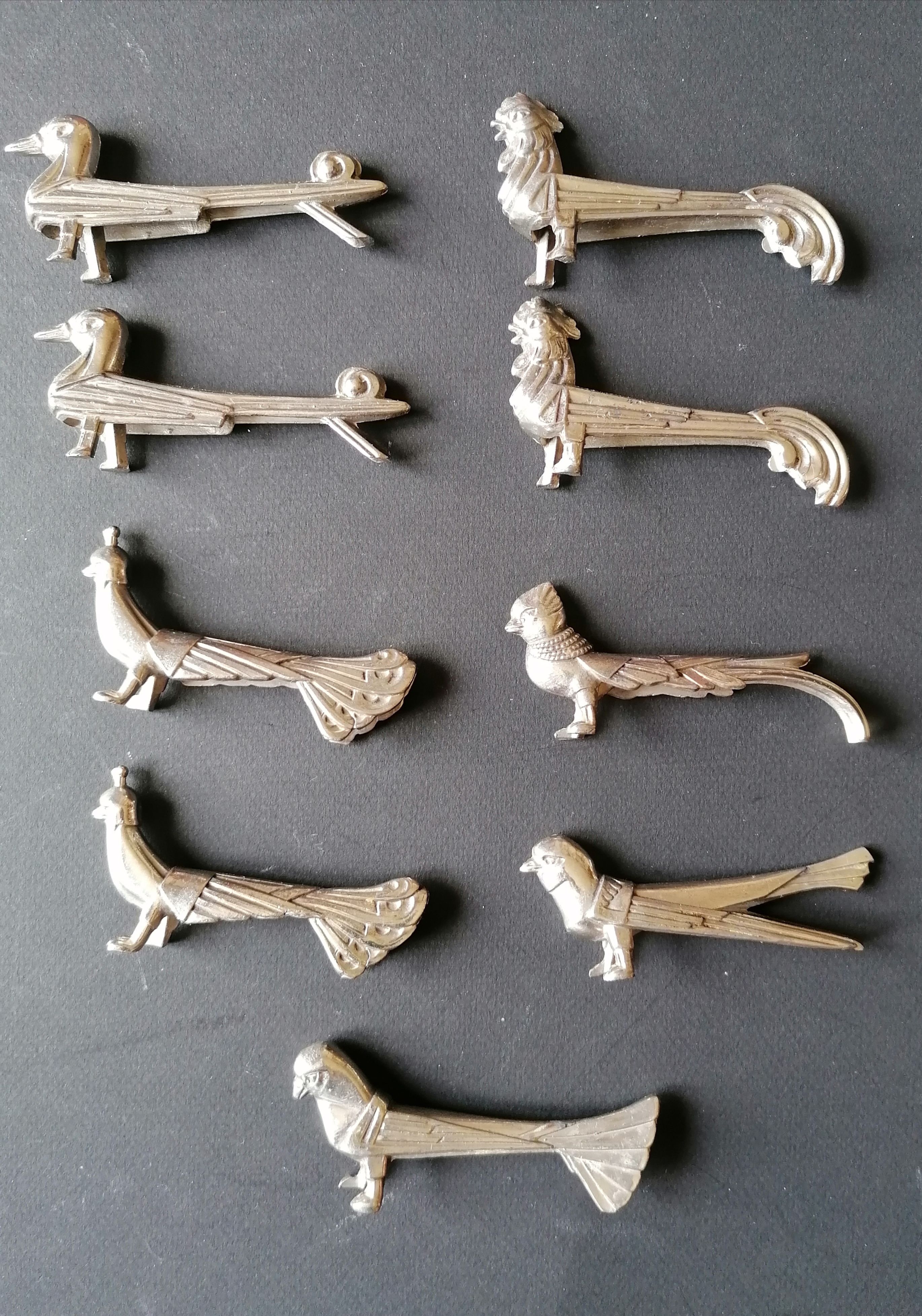 Set of 9 art deco animal knife holders
