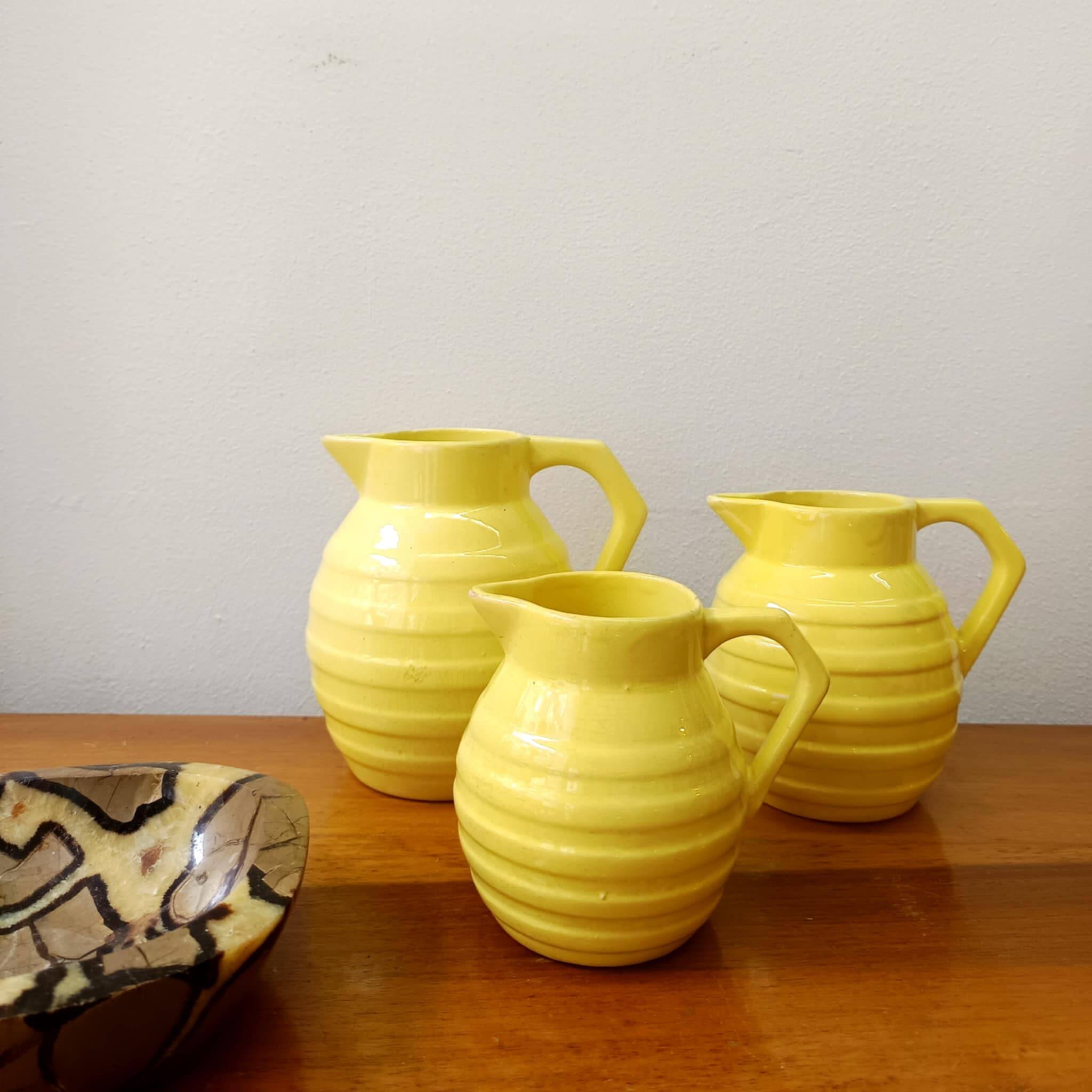 3 Orchies art deco pitchers in yellow ceramic